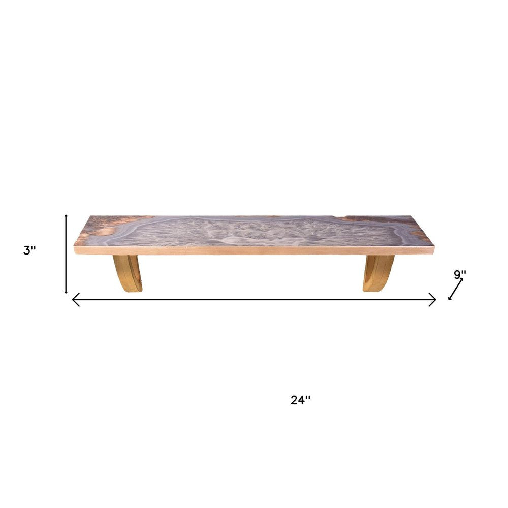 24" Gray And Natural Wood Wall Mounted Accent Shelf. Wall mounted shelve isolated on a plain white background, finished in gray wood.