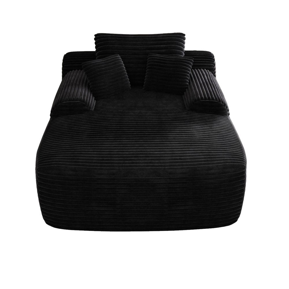 67" Black Corduroy Oversized Chaise Lounge Chair And Toss Pillows. Accent chair isolated on a plain white background, in a black finish.