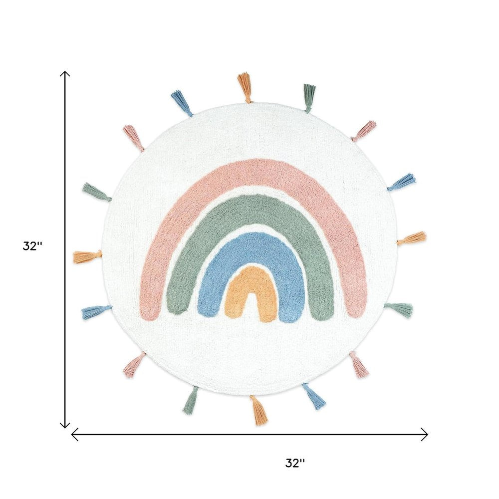 32" White Blue And Pink Cotton Rainbows Round Youthful Bath Rug. Bath rug isolated on a plain white background, showing a blue cotton surface.