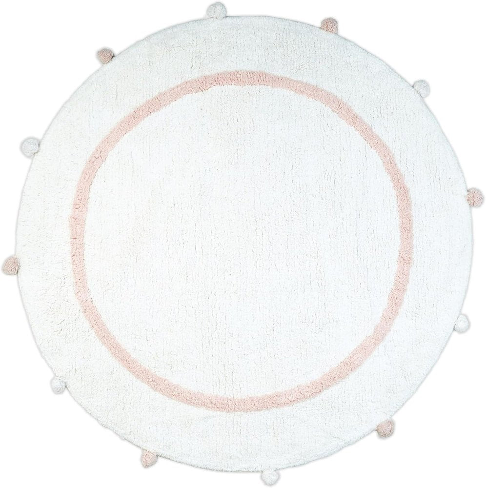 Round white cotton bath rug with a light pink border and pom-pom accents on a white background.