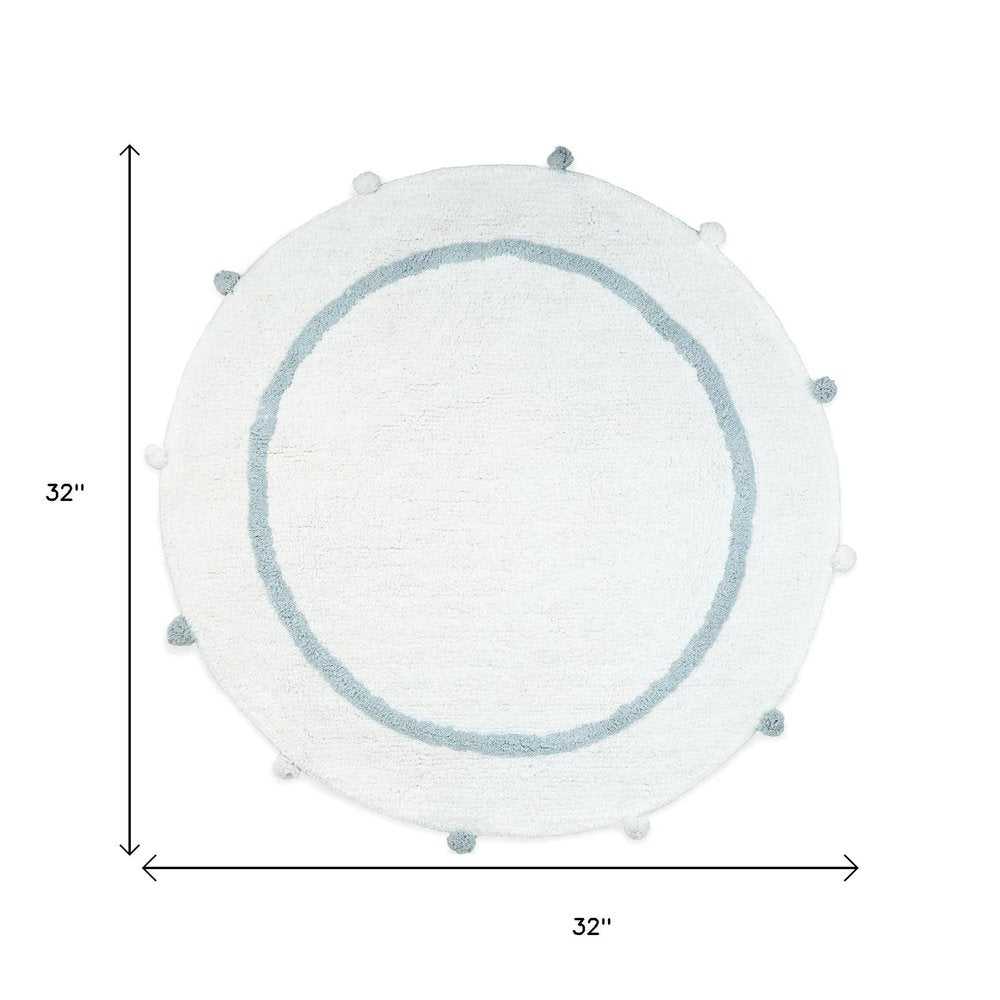 32" Baby Blue And White Cotton Round Geometric Bath Rug. Bath rug isolated on a plain white background, showing a white cotton surface.