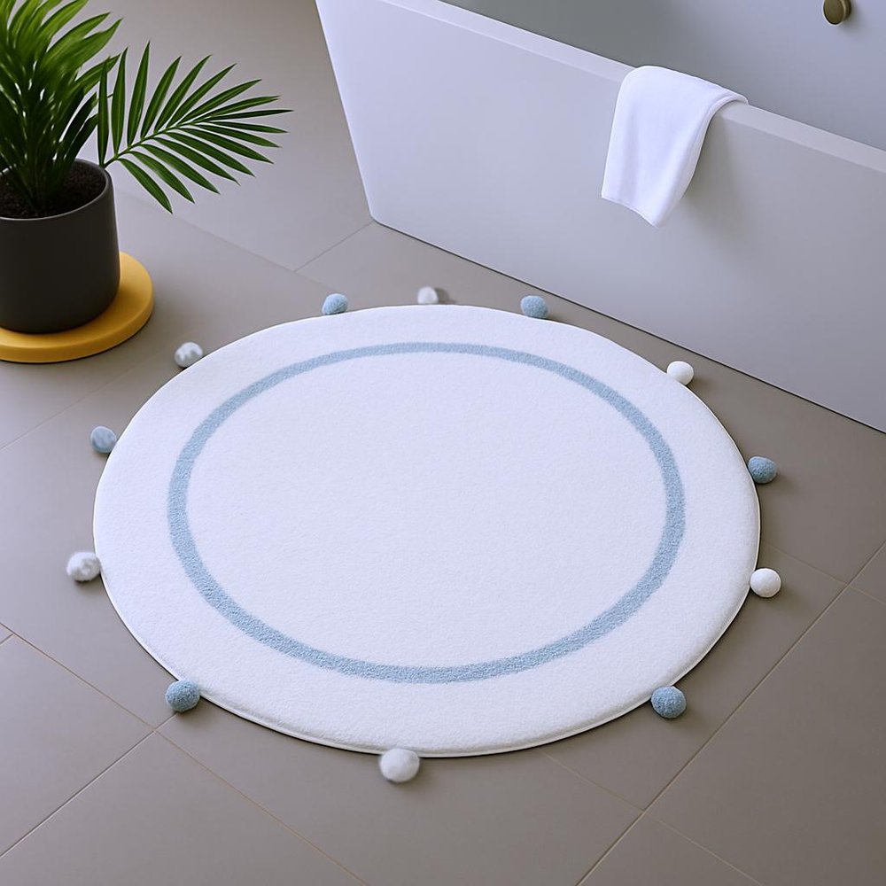 32" Baby Blue And White Cotton Round Geometric Bath Rug shown outdoors on a tiled patio.