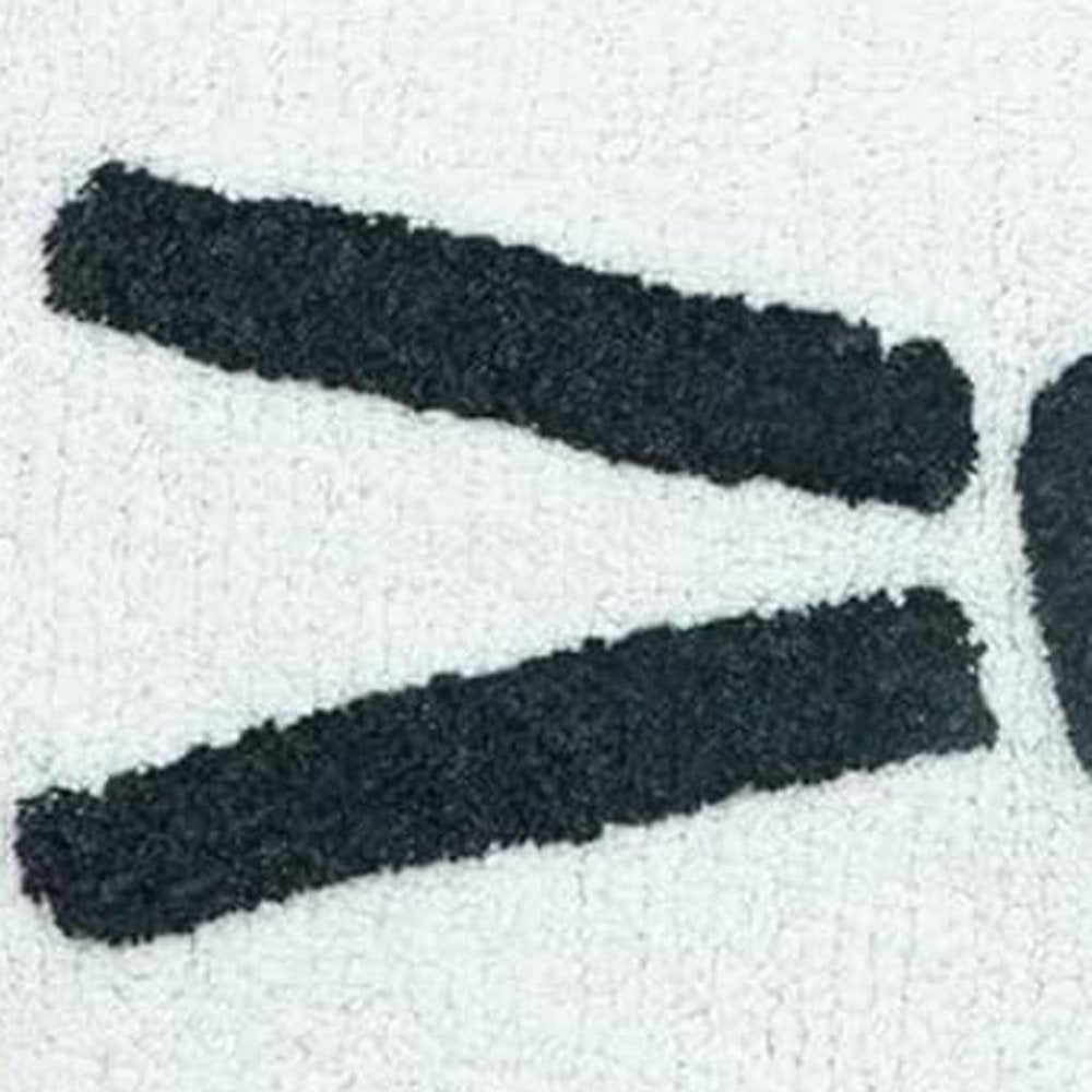 32" Black And White Cotton Cat Shaped Youthful Bath Rug. Bath rug isolated on a plain white background, finished in black cotton.