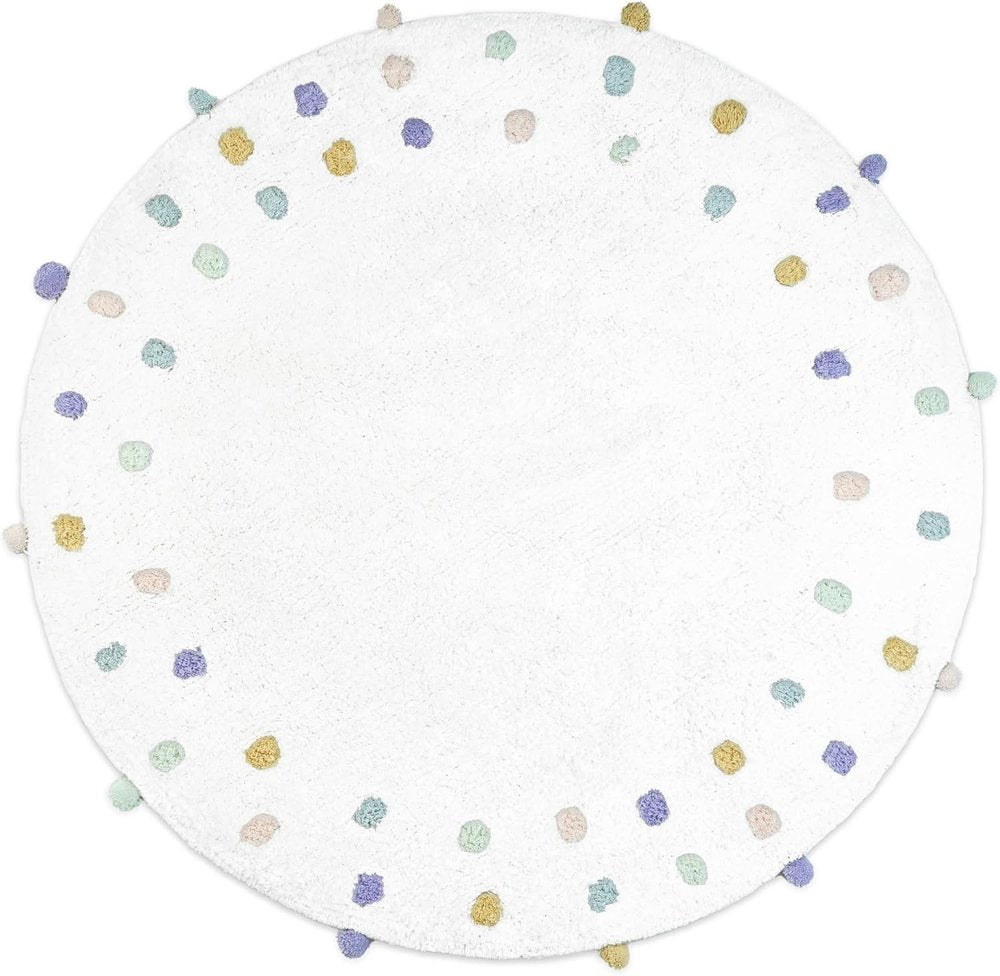 White round bath rug with scattered pastel polka dots and pom-poms.