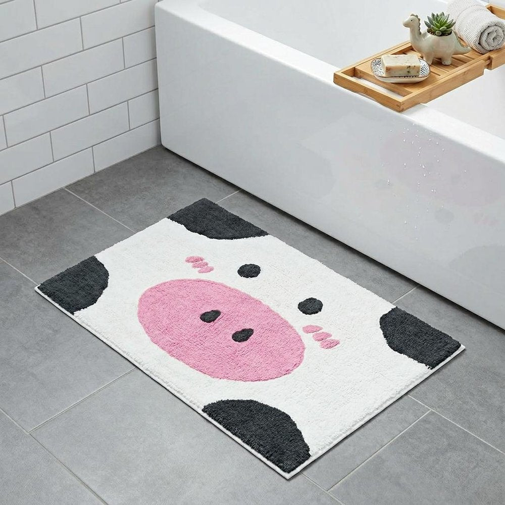 32" White Black And Pink Cotton Cow Youthful Bath Rug. Bath rug isolated on a plain white background, finished in white cotton.