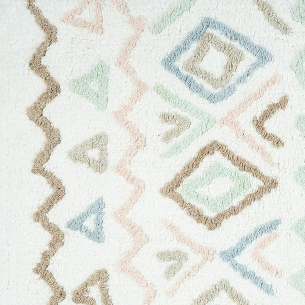 32" Blue Brown And White Cotton Geometric Bath Rug. Bath rug isolated on a plain white background, showing a white cotton surface.