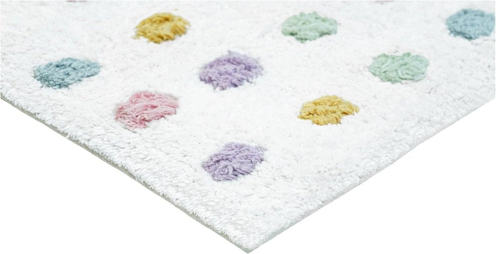 32" White Purple And Pink Cotton Polka Dots Bath Rug. Bath rug isolated on a plain white background, finished in white cotton.