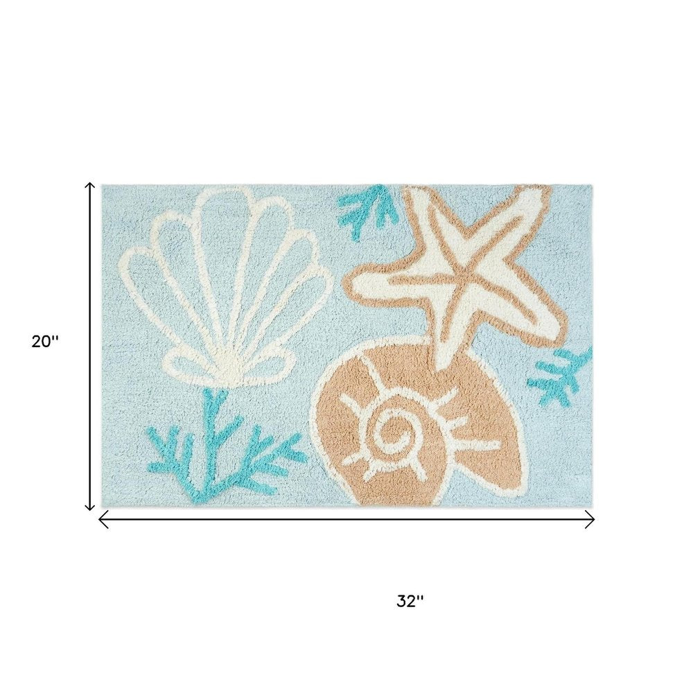 32" Blue Tan And White Cotton Seashells And Coral Bath Rug. Bath rug isolated on a plain white background, in a white cotton finish.