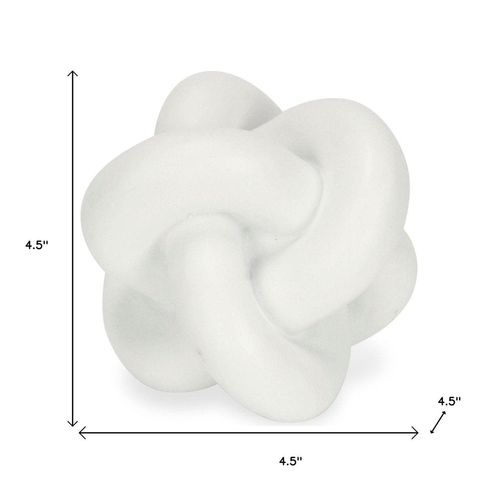 5" White Resin Knot Tabletop Sculpture. Sculpture isolated on a plain white background, showing a white resin surface.