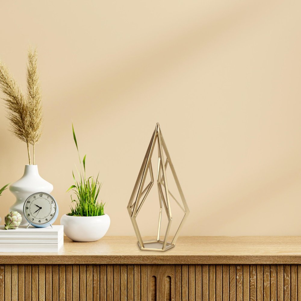 14" Gold Metal Open Geometric Tabletop Sculpture. Sculpture in gold metal.