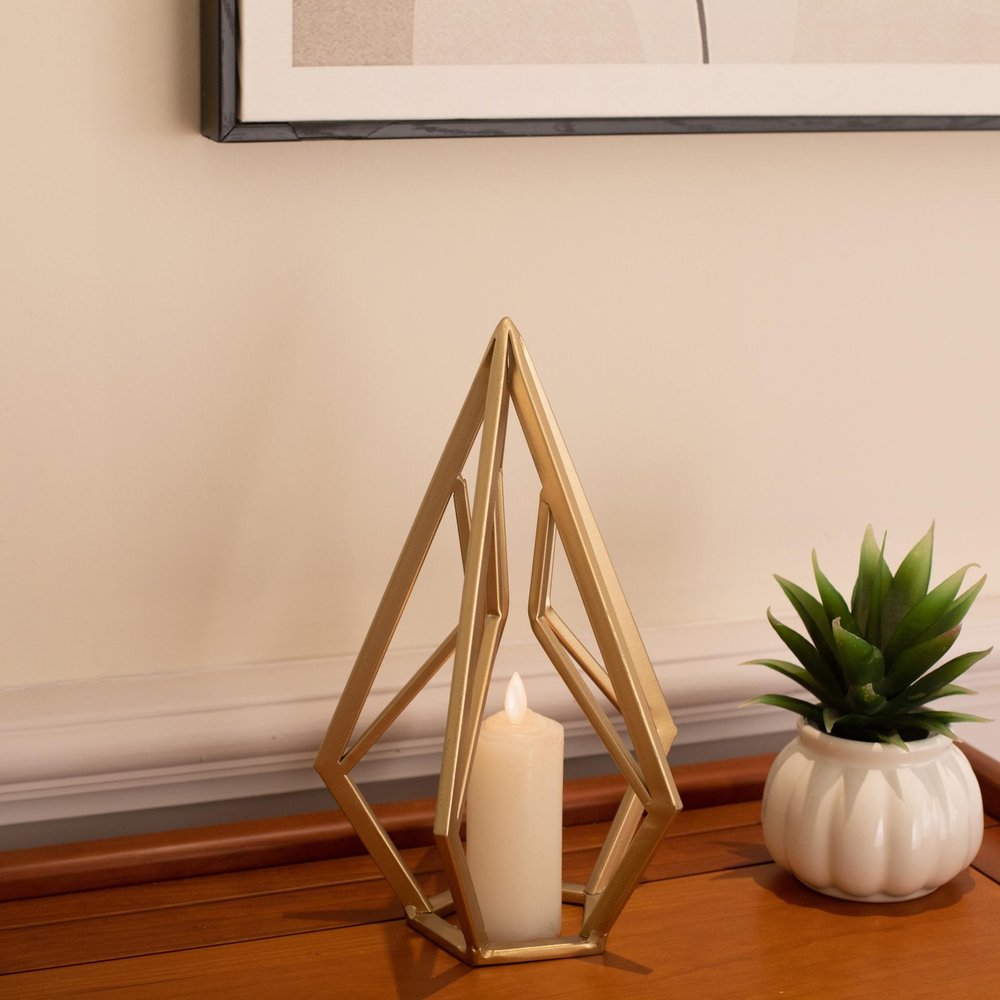 10" Gold Metal Open Geometric Tabletop Sculpture. Sculpture in gold metal.