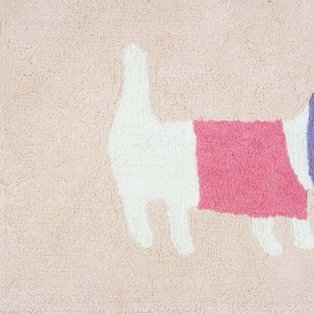 Close-up of 32" Pink And Purple Cotton Dog Youthful Bath Rug showing the pink cotton texture.