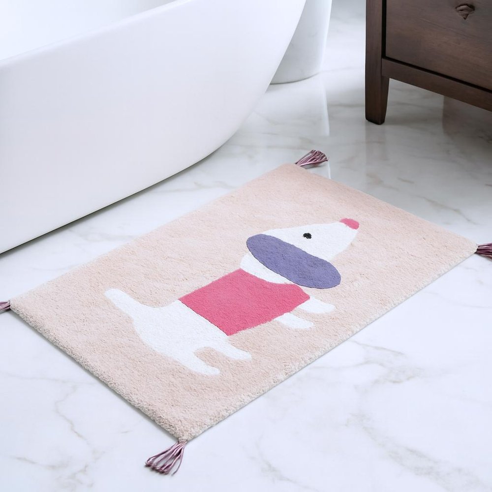 32" Pink And Purple Cotton Dog Youthful Bath Rug shown outdoors on an outdoor setting.