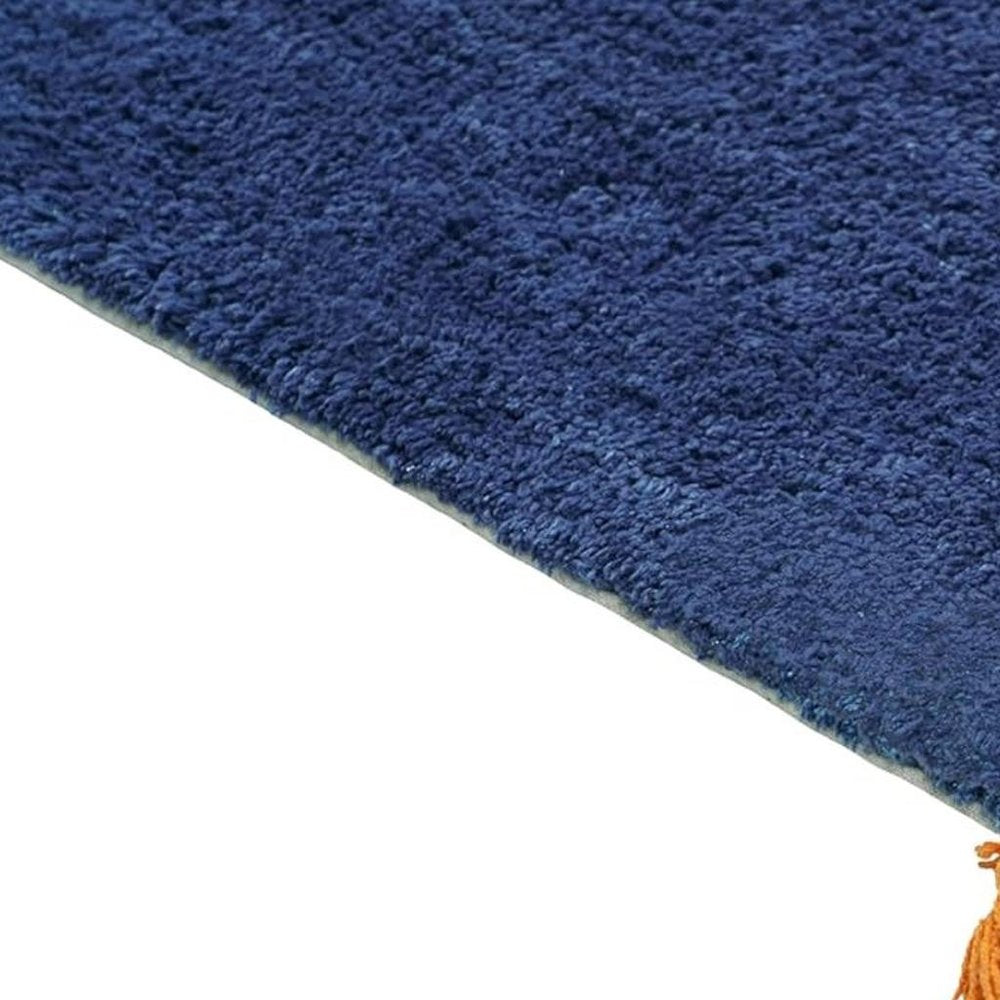 32" Blue Orange And White Cotton Dog Youthful Bath Rug. Bath rug in blue cotton.