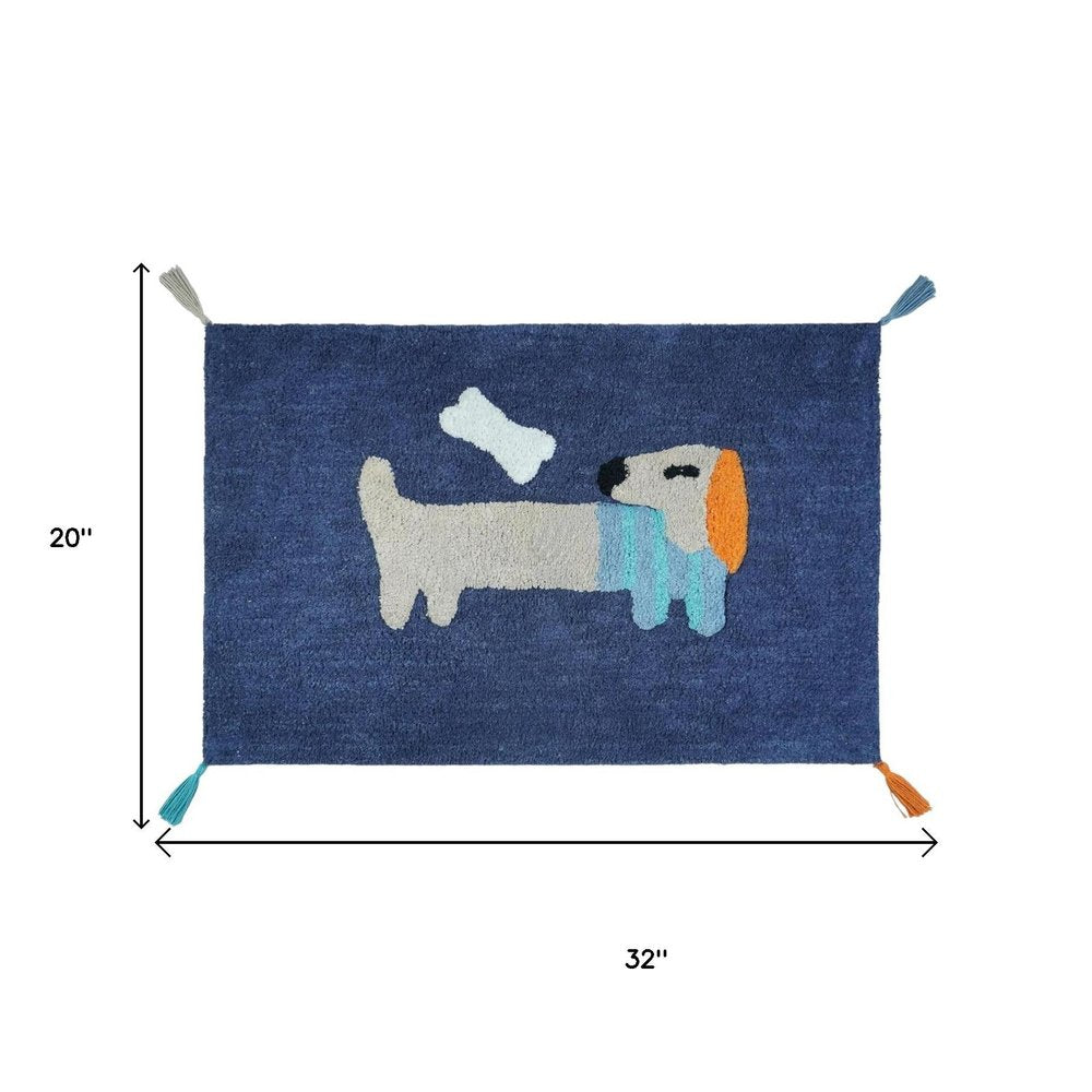 32" Blue Orange And White Cotton Dog Youthful Bath Rug. Bath rug isolated on a plain white background, in a blue cotton finish.