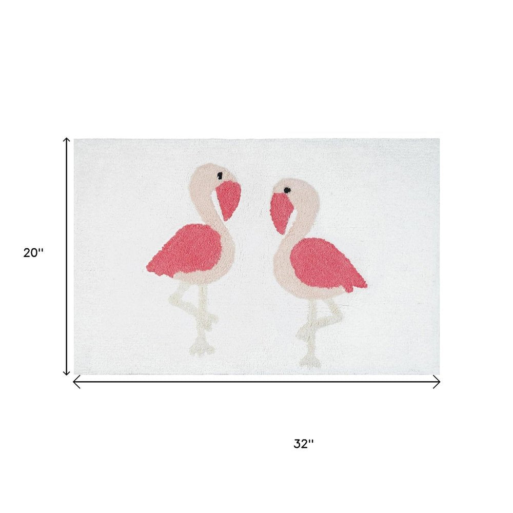 32" Pink And White Cotton Flamingo Bath Rug. Bath rug isolated on a plain white background, showing a white cotton surface.