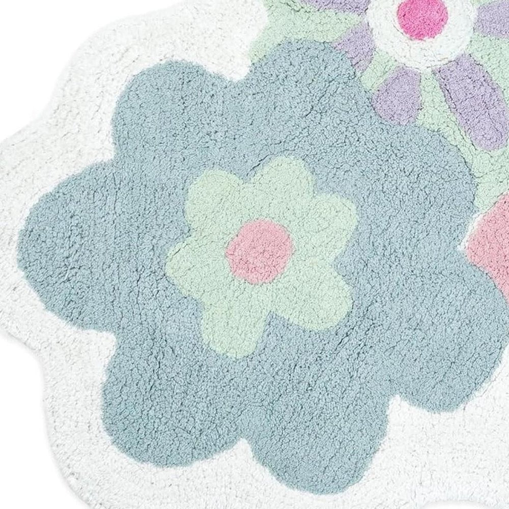32" Pink And White Cotton Flowers Floral Bath Rug. Bath rug isolated on a plain white background, showing a white cotton surface.