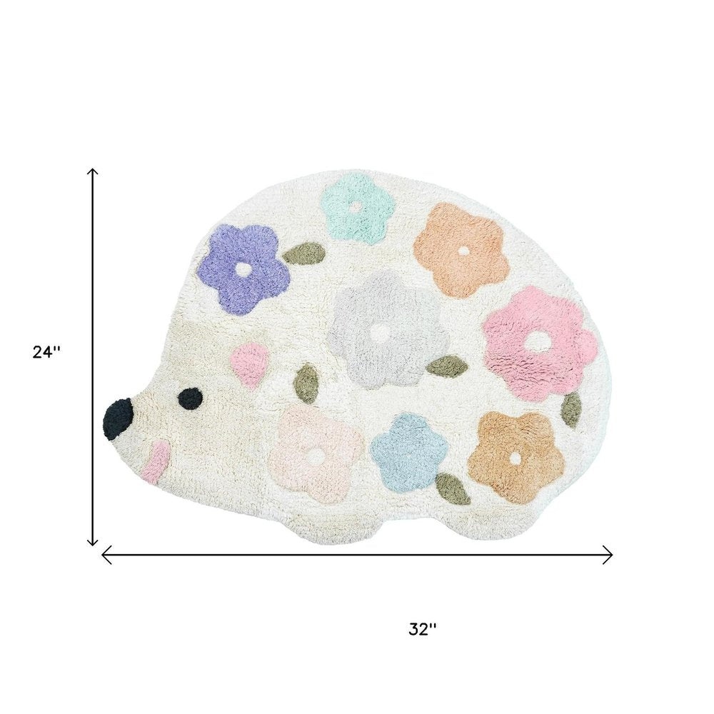 32" White Blue And Pink Cotton Hedgehog Floral Print Bath Rug. Bath rug isolated on a plain white background, finished in white cotton.
