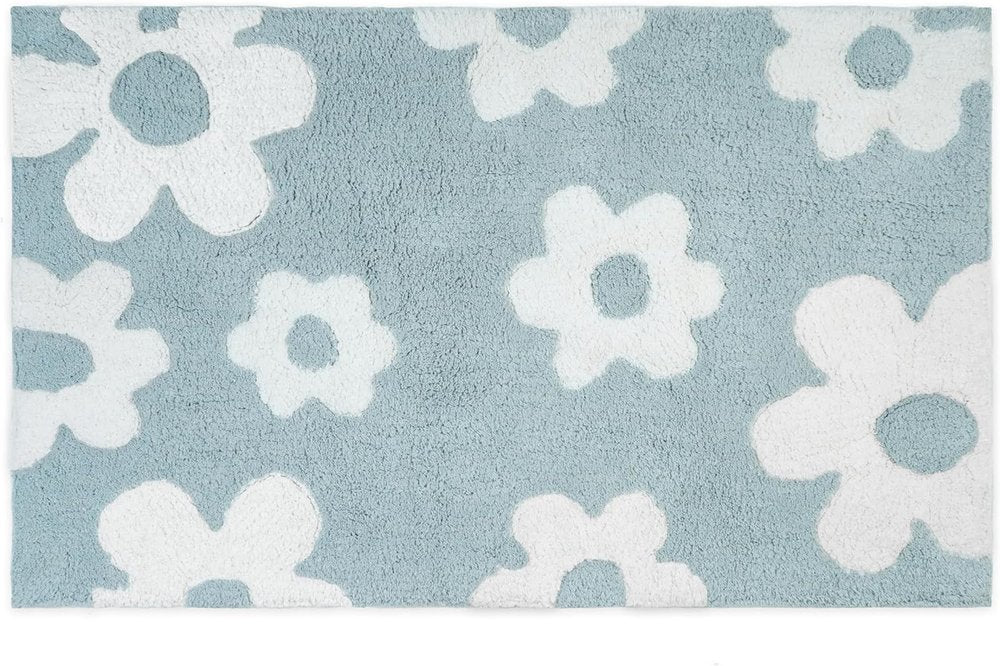 32" Blue And White Cotton Floral Bath Rug. Bath rug isolated on a plain white background, showing a white cotton surface.
