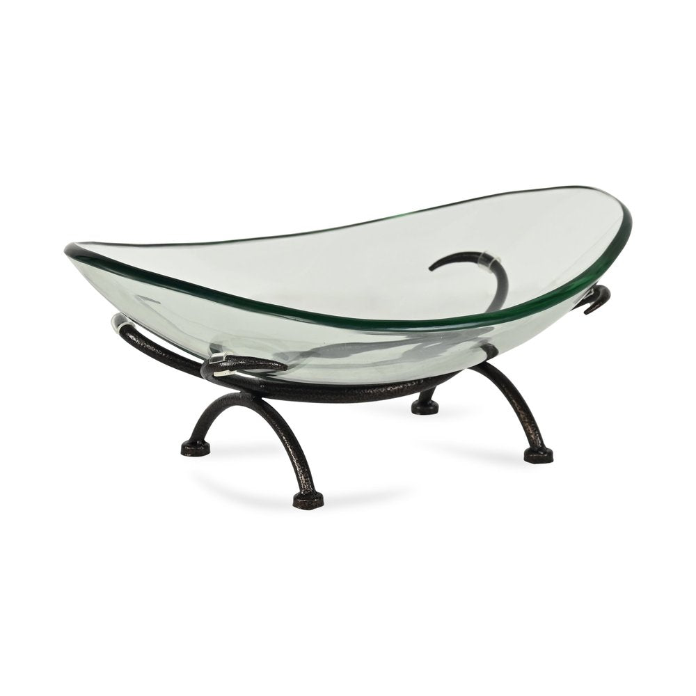 17" Clear And Black Glass And Metal Oval Decorative Bowl With Stand. Home product isolated on a plain white background, finished in clear glass.