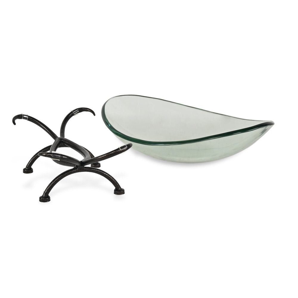 17" Clear And Black Glass And Metal Oval Decorative Bowl With Stand. Home product isolated on a plain white background, in a black glass finish.