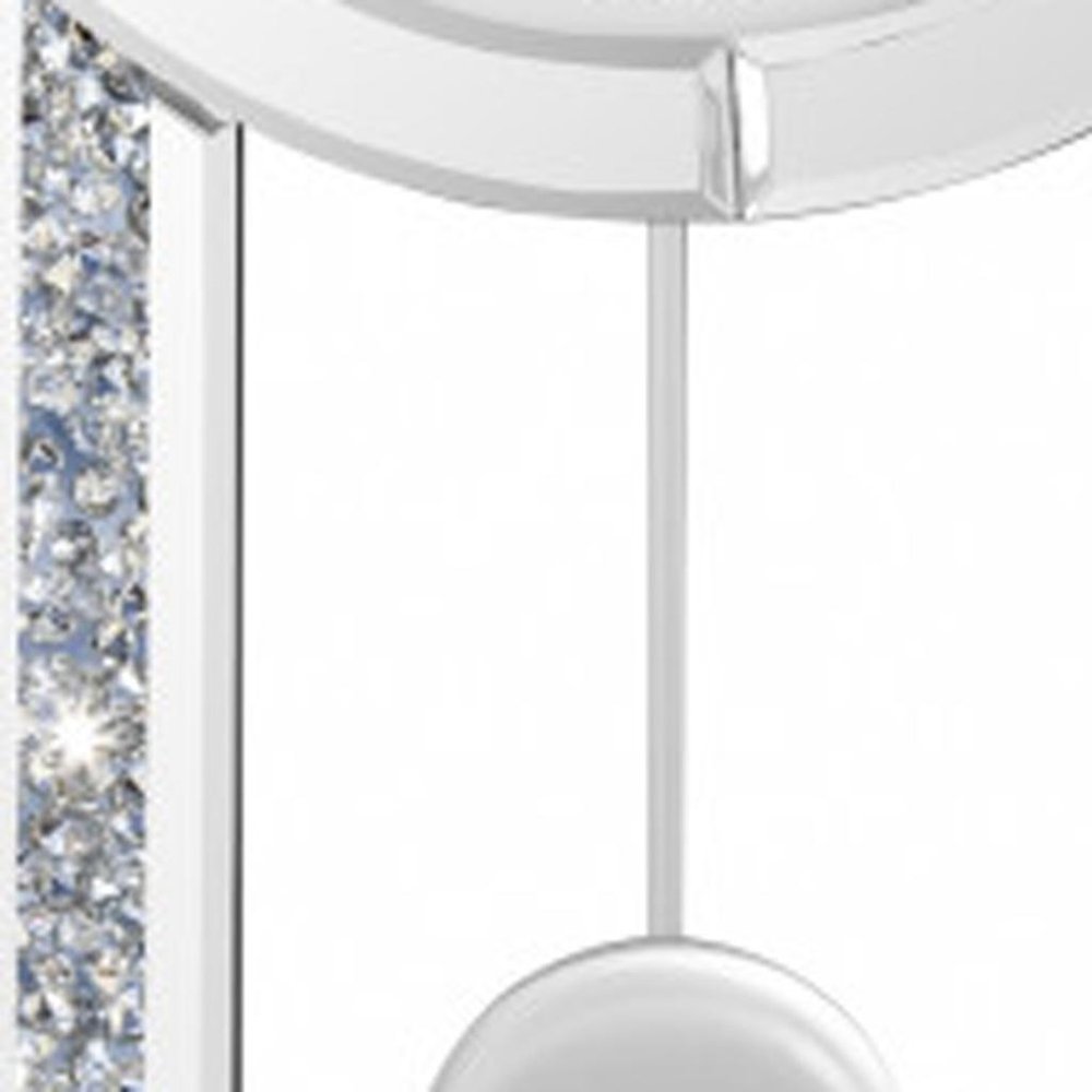 15" Silver Faux Crystal And Mirrored Glass Silent Analog Oval Wall Clock. Wall clock isolated on a plain white background, in a silver glass finish.
