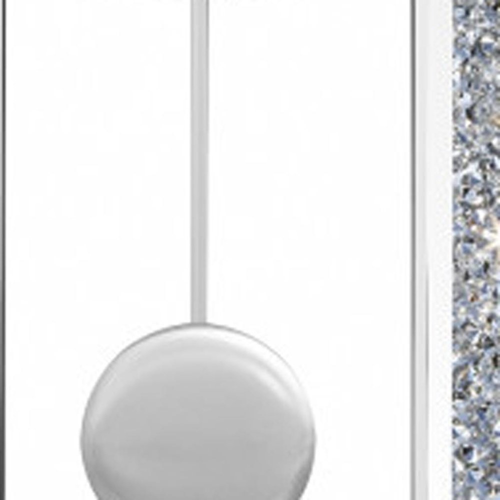 15" Silver Faux Crystal And Mirrored Glass Silent Analog Oval Wall Clock. Wall clock isolated on a plain white background, showing a silver glass surface.
