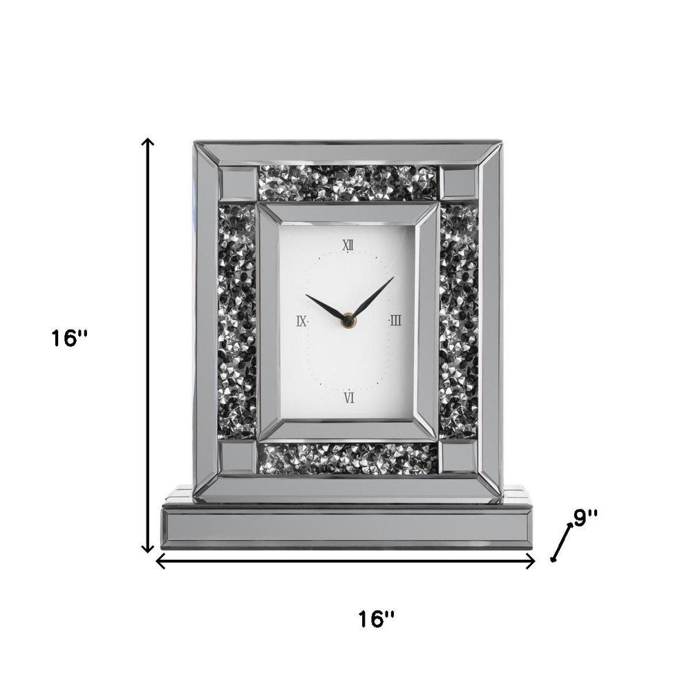 16" Silver And Black Faux Crystal And Mirrored Glass Table Clock. Wall clock isolated on a plain white background, showing a silver glass surface.