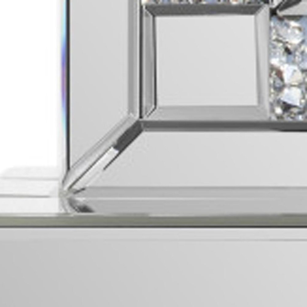 Close-up of 16" Silver And White Faux Crystal And Mirrored Glass Table Clock showing silver glass detail.