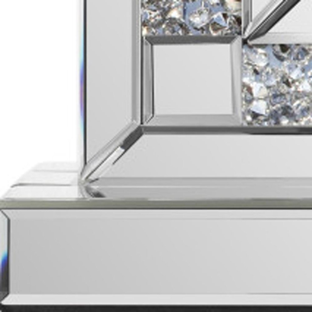 Close-up of 16" Silver And White Faux Crystal And Mirrored Glass Table Clock showing silver glass detail.