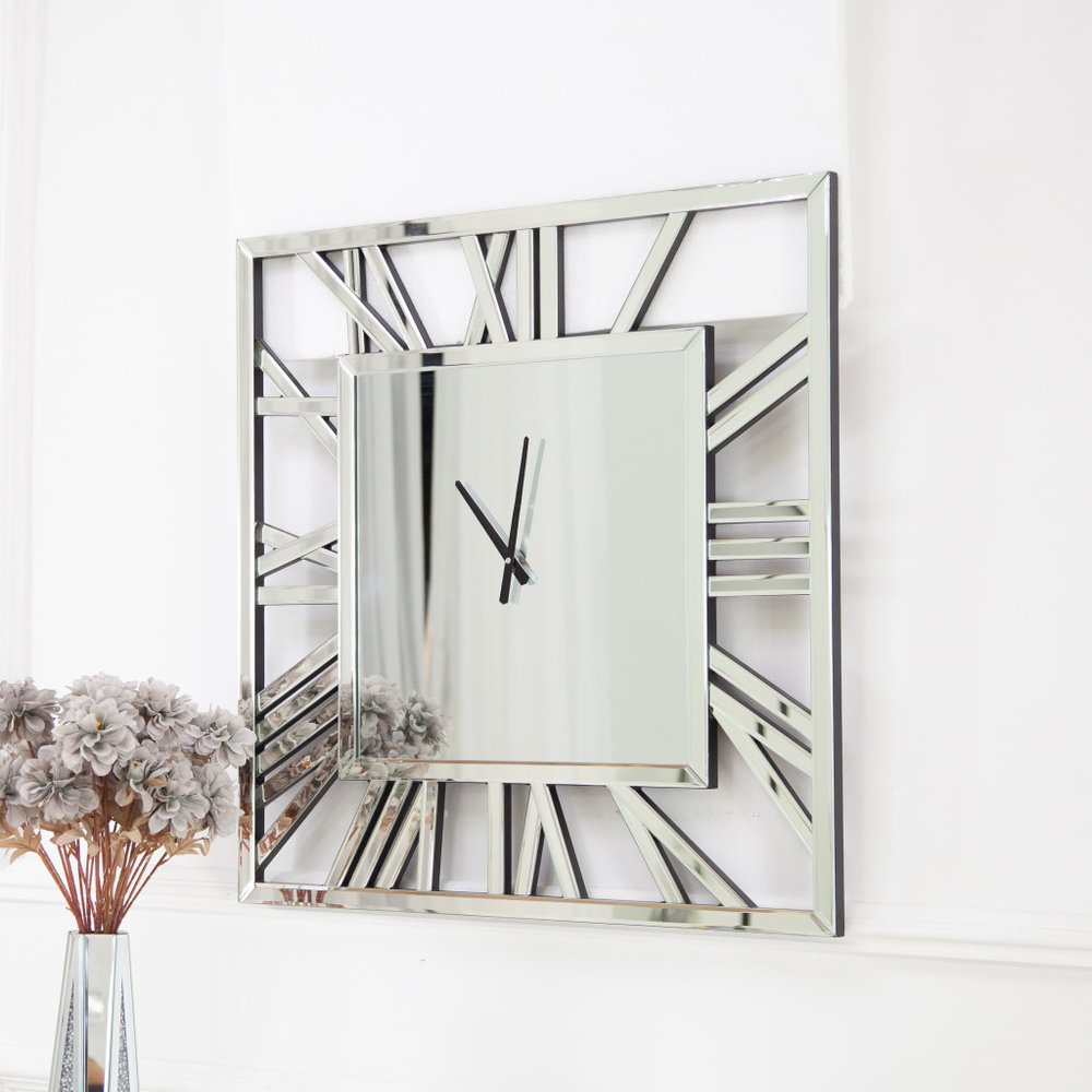 27" Silver Mirrored Glass Silent Analog Square Wall Clock. Wall clock isolated on a plain white background, finished in silver glass.