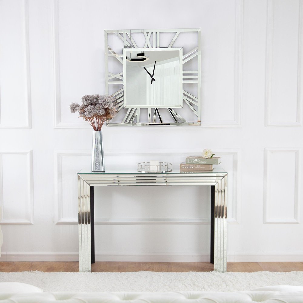 27" Silver Mirrored Glass Silent Analog Square Wall Clock. Wall clock isolated on a plain white background, showing a silver glass surface.