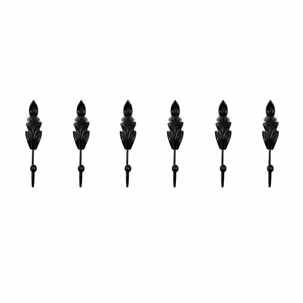 Set of Six Black Steel Feather Wall Hooks on a white background