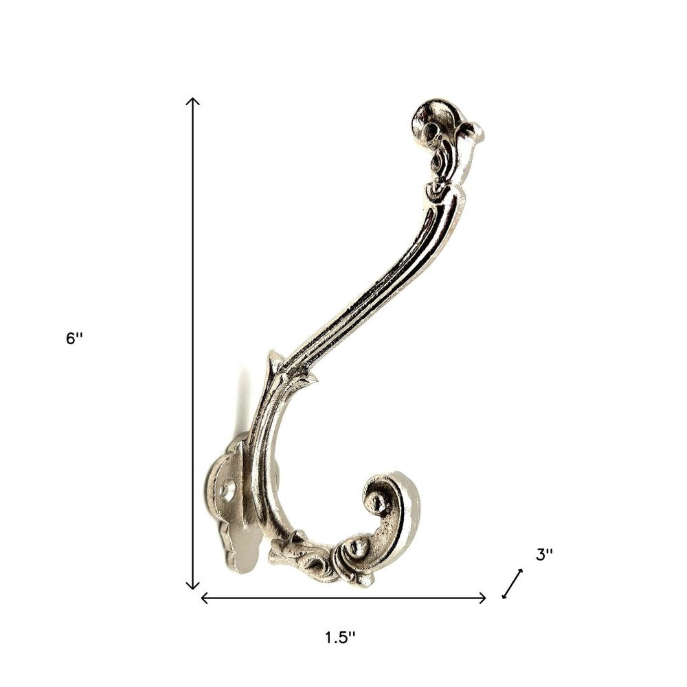 Set of Six Silver Cast Iron Baroque Scroll Wall Hooks on a white background