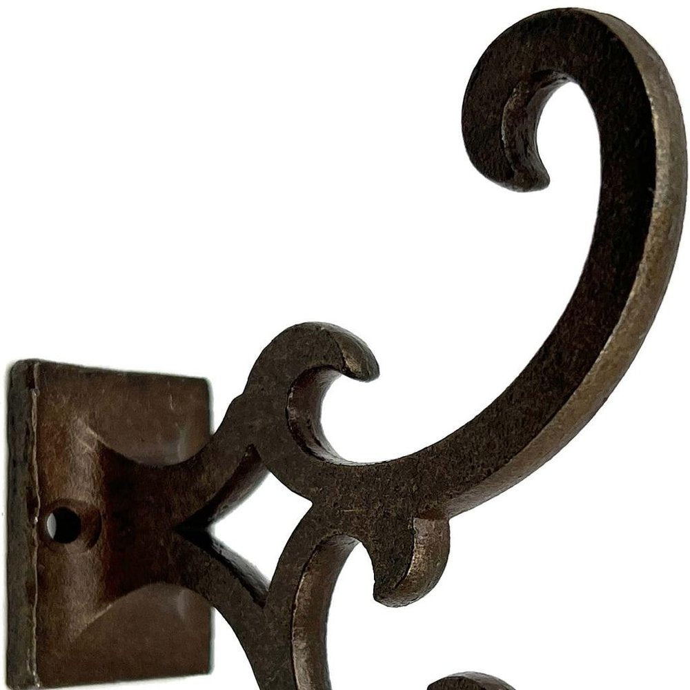 Set of Six Antiqued Bronze Cast Iron Scroll Wall Hooks on a white background