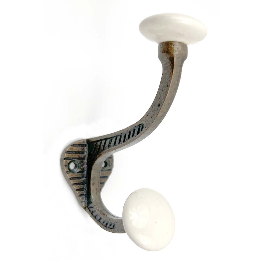 Set of Six Bronze And White Cast Iron And Ceramic Double Wall Hooks on a white background