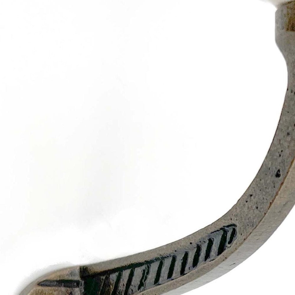 Set of Six Bronze And White Cast Iron And Ceramic Double Wall Hooks on a white background