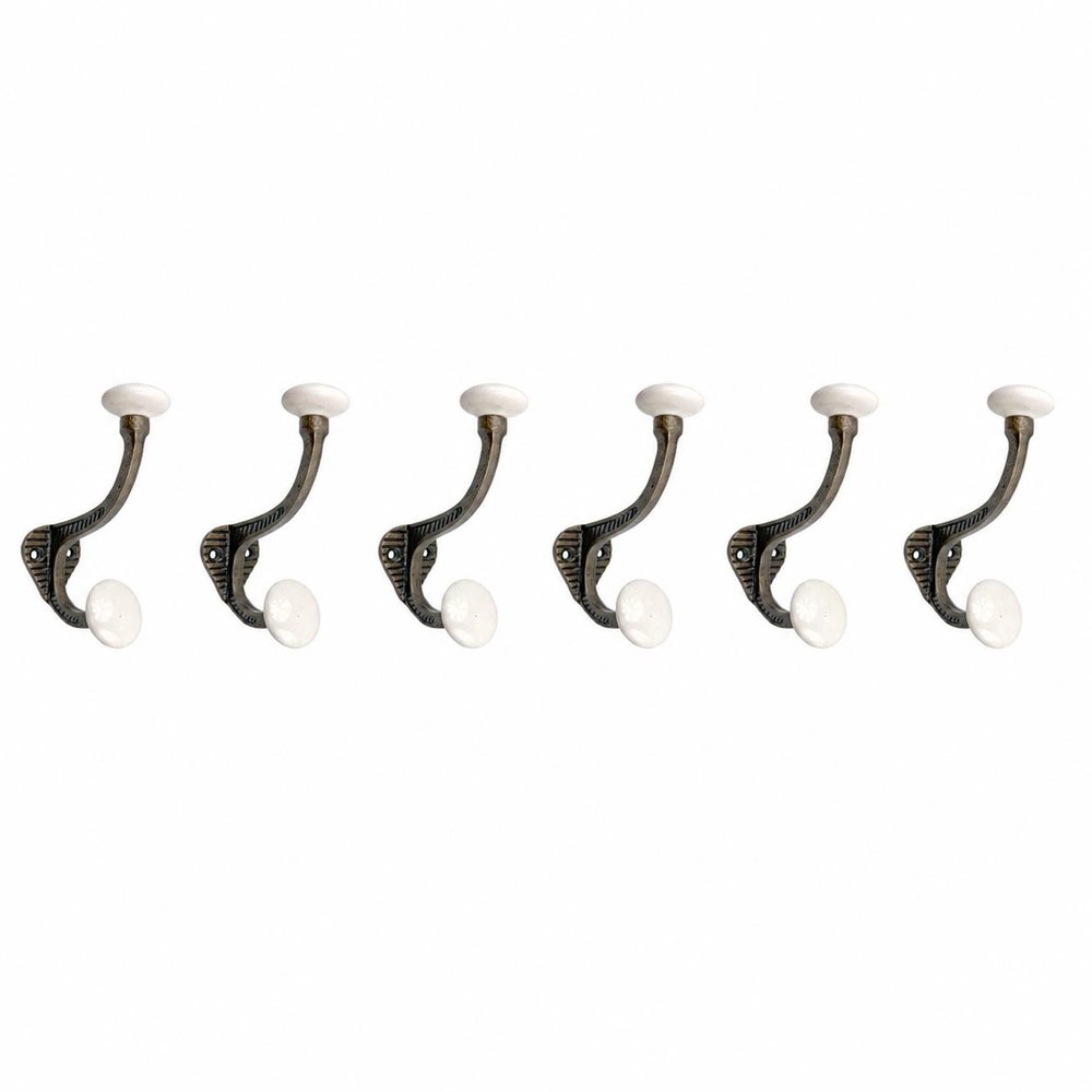 Set of Six Bronze And White Cast Iron And Ceramic Double Wall Hooks on a white background