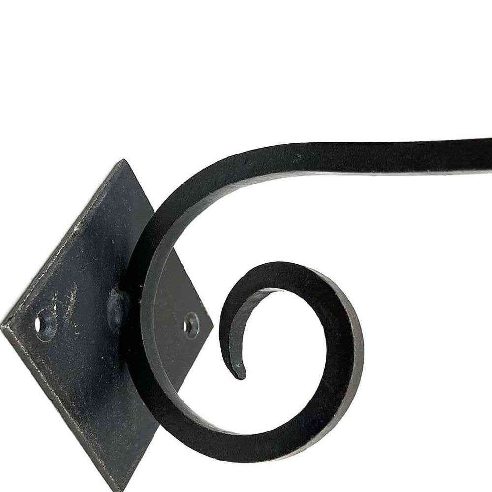 Set of Six Black Cast Iron Scroll Wall Hooks on a white background
