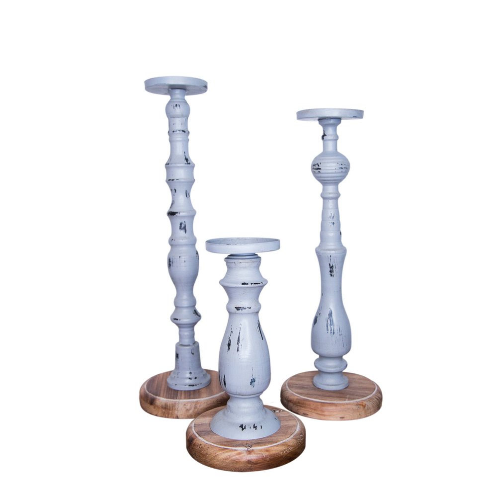 Set of Three Gray Distressed Wood Tabletop Pillar Candle Holders on a white background
