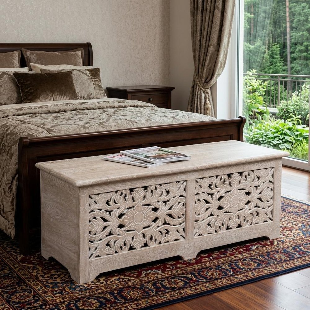 52" White Solid Wood Floral Ottoman With Storage shown outdoors on an outdoor setting with greenery.