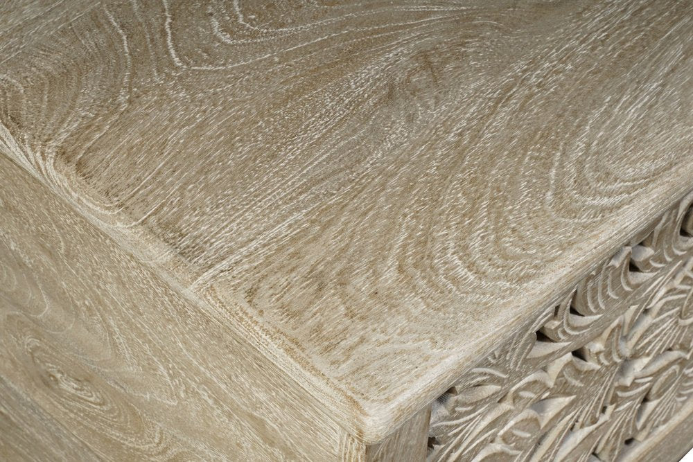 Detail view of 52" Gray Solid Wood Floral Ottoman With Storage, filling the frame with the wood texture.