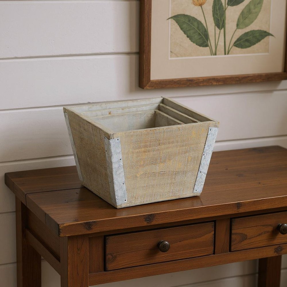 Set of Three Natural And Silver Metal And Wood 217 Ounce Square Distressed Planter Boxes in a home interior