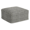 Black and white geometric patterned polyester ottoman on a white background.