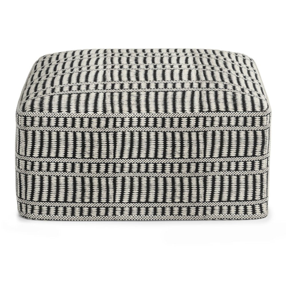 20" Black And White Polyester Geometric Outdoor Pouf Ottoman. Outdoor ottoman isolated on a plain white background, in a black fabric finish.