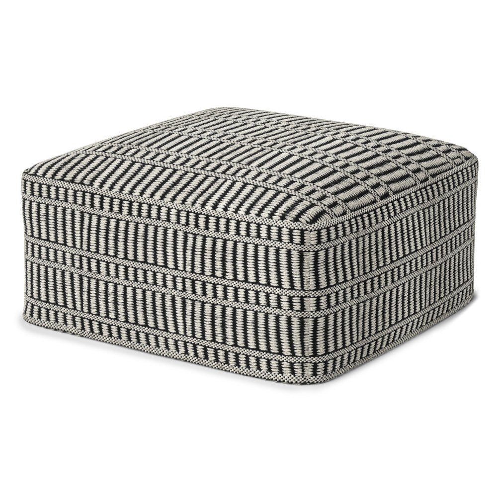 20" Black And White Polyester Geometric Outdoor Pouf Ottoman. Outdoor ottoman isolated on a plain white background, showing a black fabric surface.