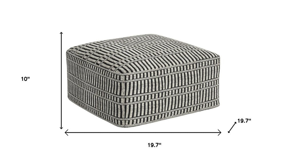 20" Black And White Polyester Geometric Outdoor Pouf Ottoman. Outdoor ottoman isolated on a plain white background, finished in white fabric.
