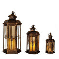 Set of Three Black And Gold Distressed Filigree Metal Tabletop Lantern Candle Holders