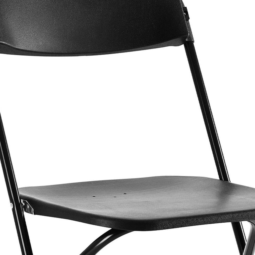 Set of Four Black Metal Outdoor Folding Stacking Dining Chairs on a white background