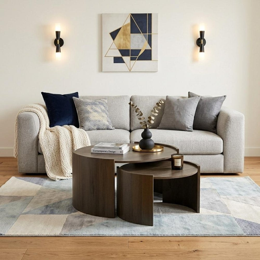 Set Of Two Ash Gray Solid Wood Round Solid Nested Coffee Tables in a home interior